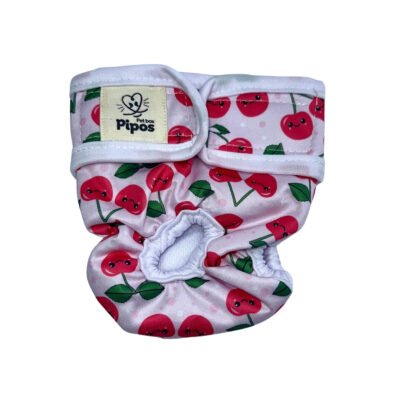 Vista frontal del pañal reutilizable para perra modelo Cerezas, con estampado de cerezas sonrientes y hojas verdes sobre fondo rosa